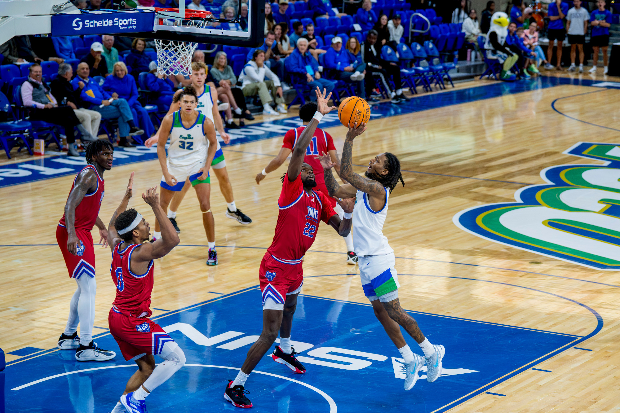 Rahmir Barno attempts a layup through contact against West Georgia