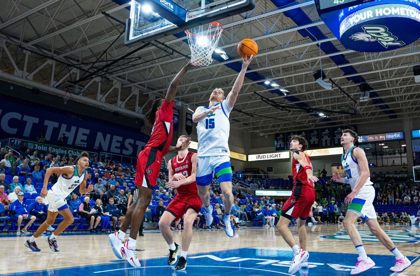 Michael Duax makes a layup against Austin Peay