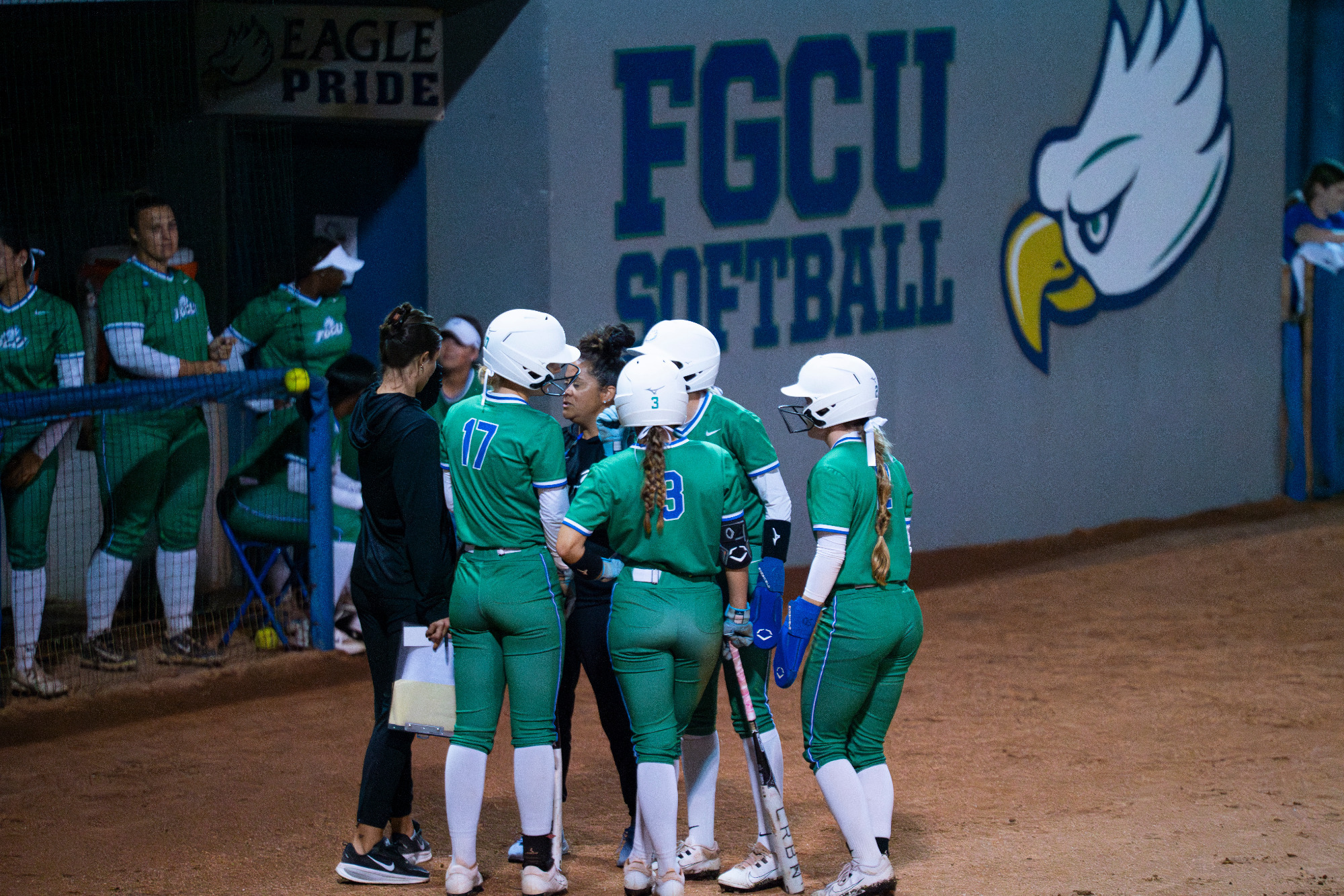 Head coach Lindsay Fico discusses strategy during an offensive timeout