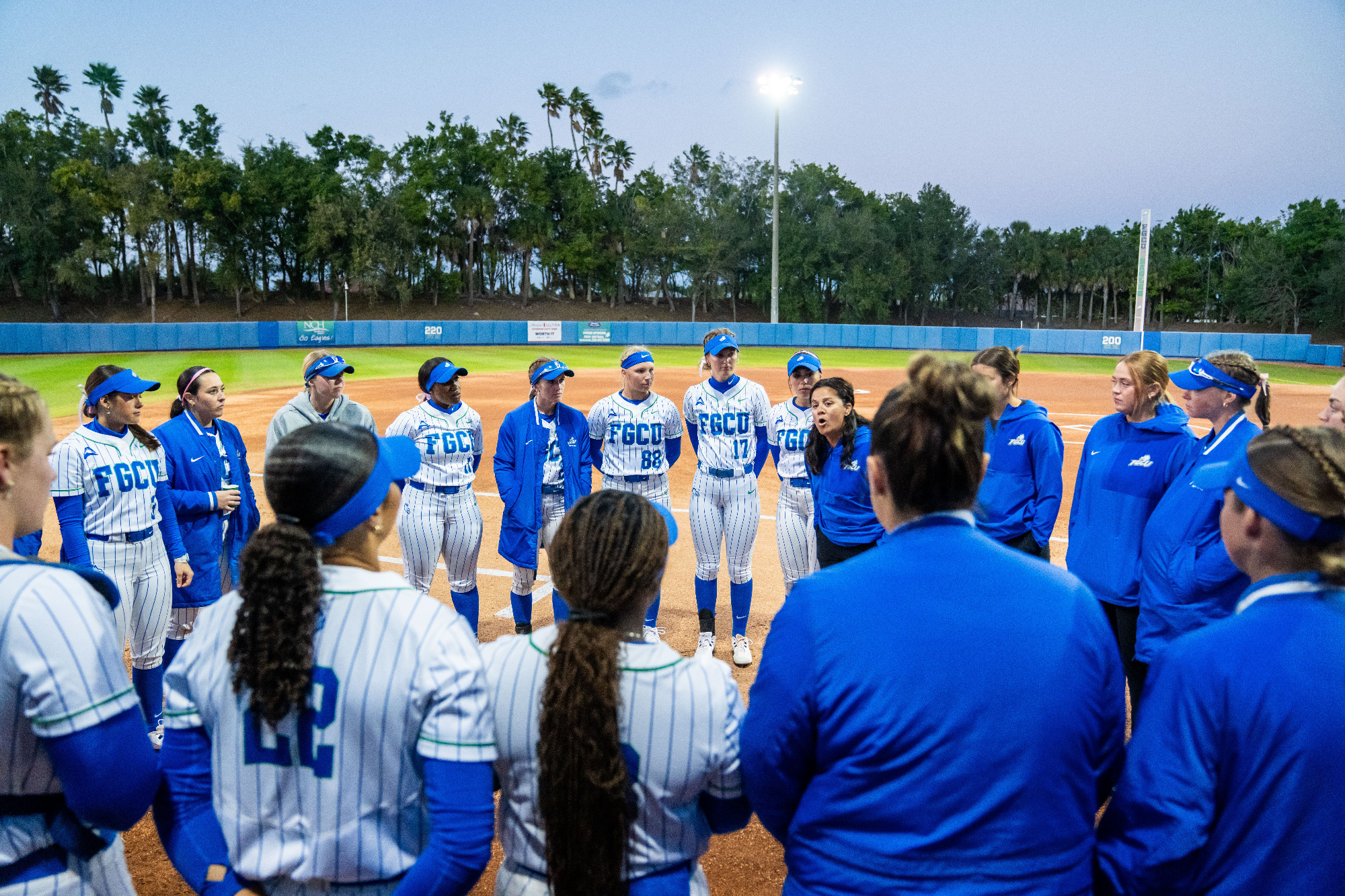 Head coach Lindsay Fico talks to the team
