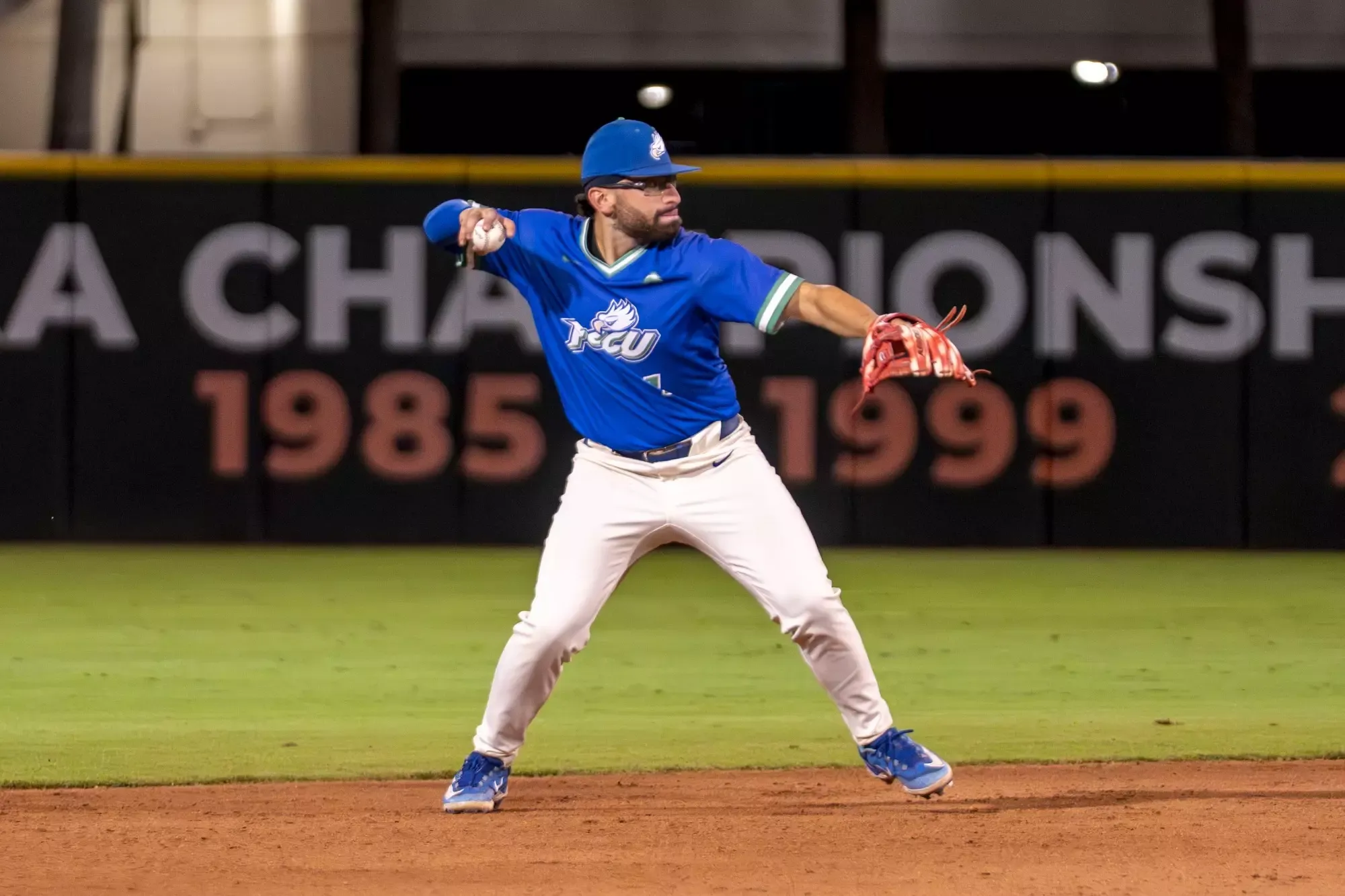 Wilfred Gonzalez throwing as FGCU plays Miami at Alex Rodriguez Park at Mark Light Field in a midweek non-conference baseball game in Coral Gables, Florida.