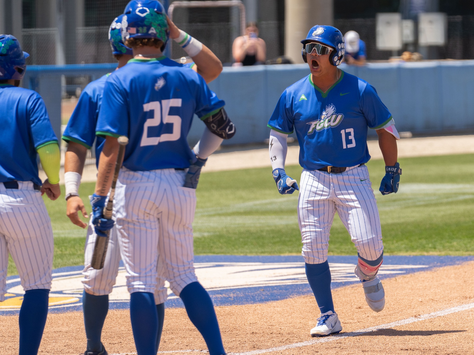 Javier Gorostola celebrates after hitting one of his two home runs as FGCU hosts Jacksonville in the third game of a three-game ASUN series at Swanson Stadium.