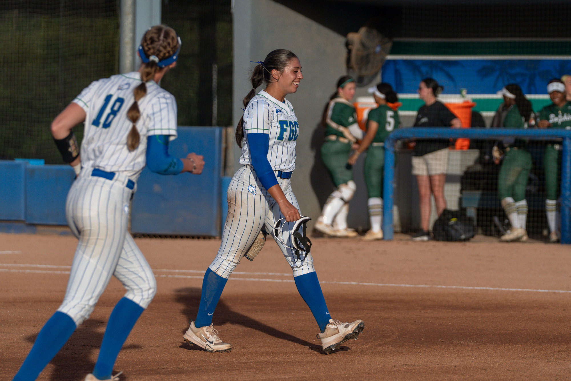 Julia Bacoulis smiles after recording one of her nine strikeouts against Jacksonville