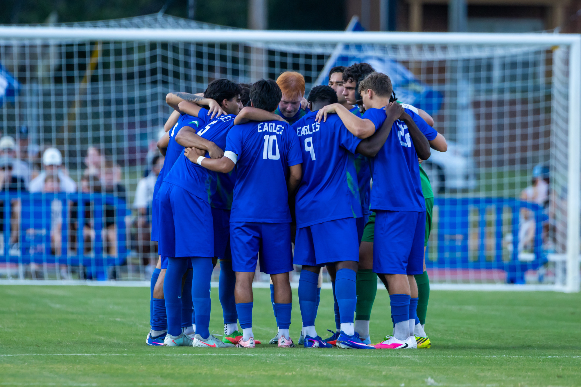 FGCU men's soccer huddles against Georgia Southern