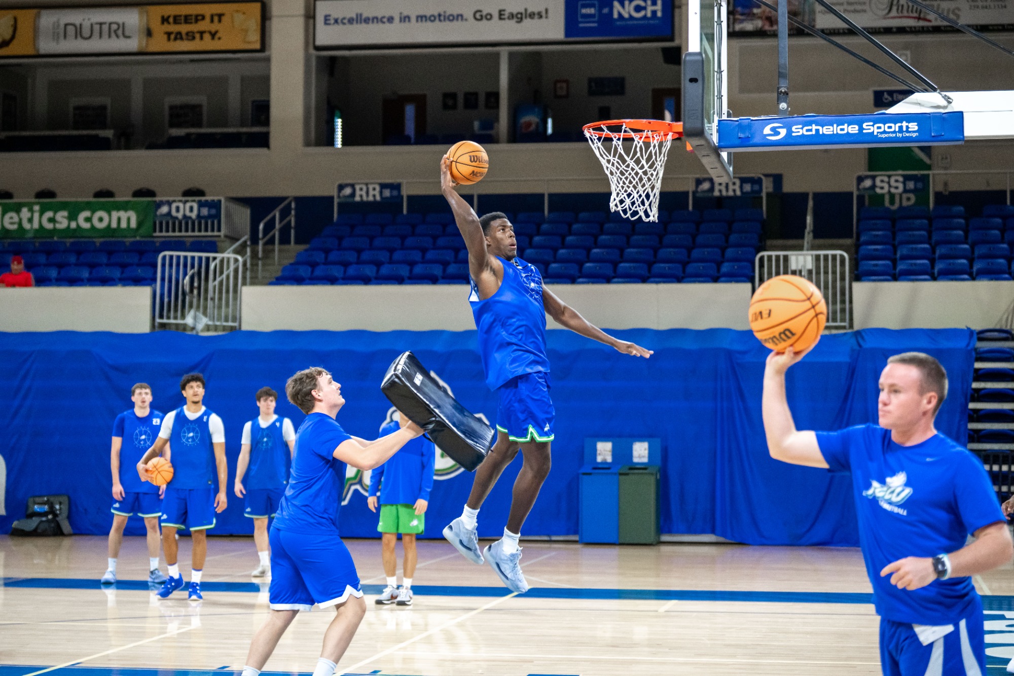CJ Outlaw goes up for a dunk as FGCU Men's Basketball holds its first official team practice of the 2026-27 season inside Alico Arena.