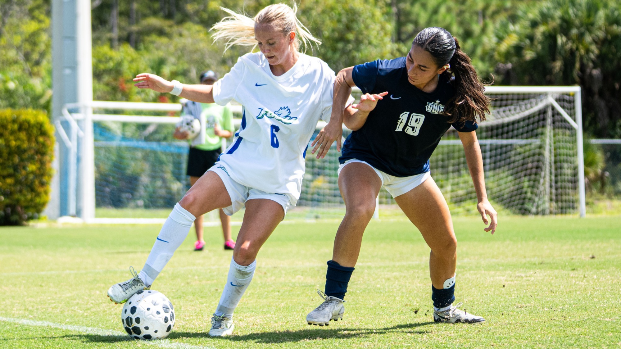 Avery White battles with a West Florida defender