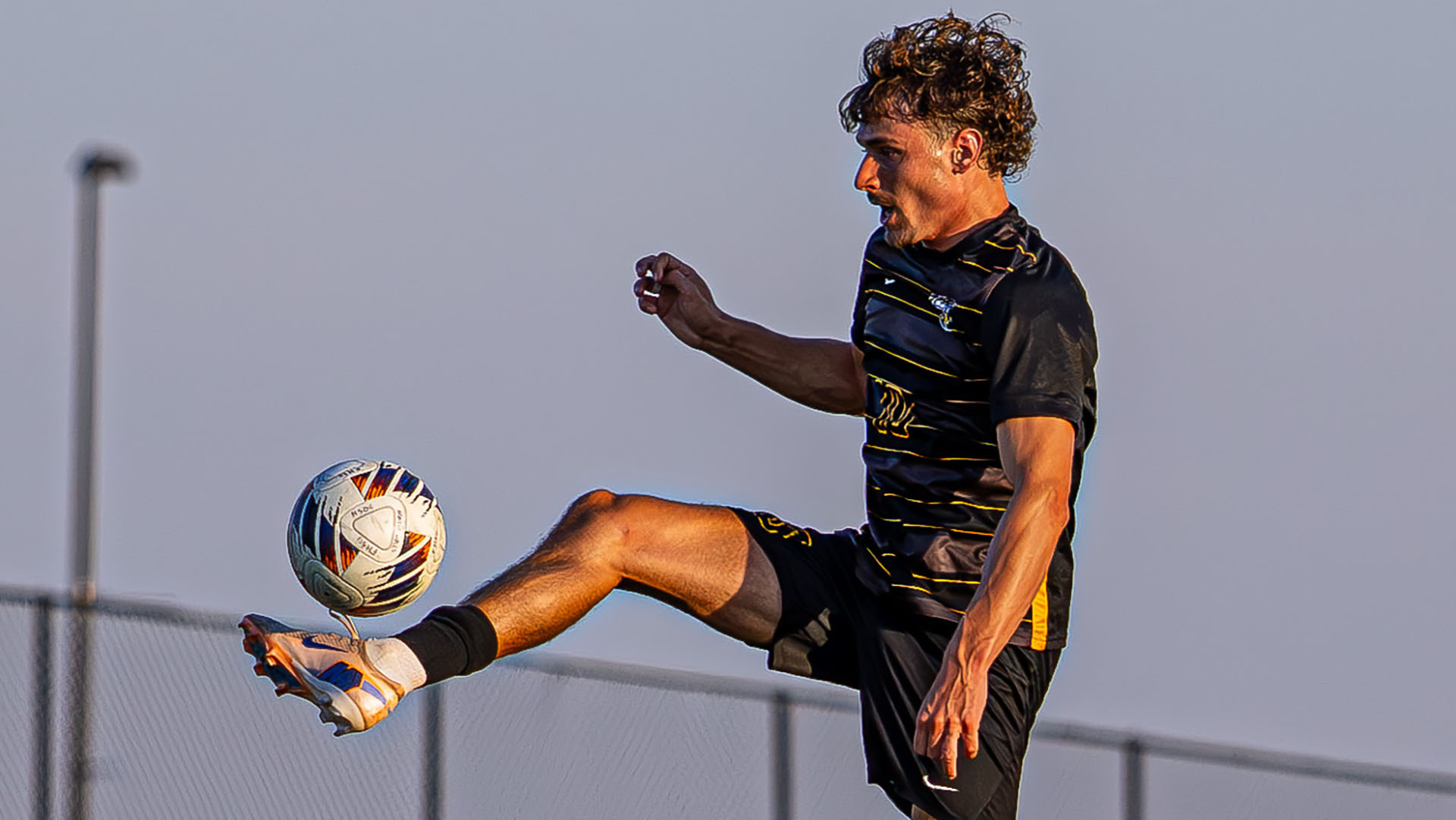 Len Valkema collects a ball against Regis 8-29-26