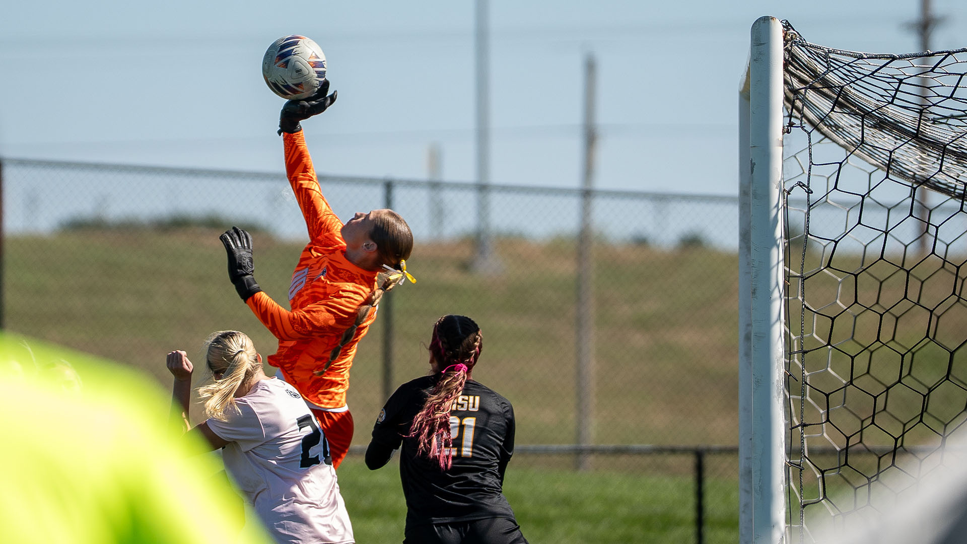 Katie Stodkopf punches a ball up and over the crossbar in a match vs NWMSU 10-18-26