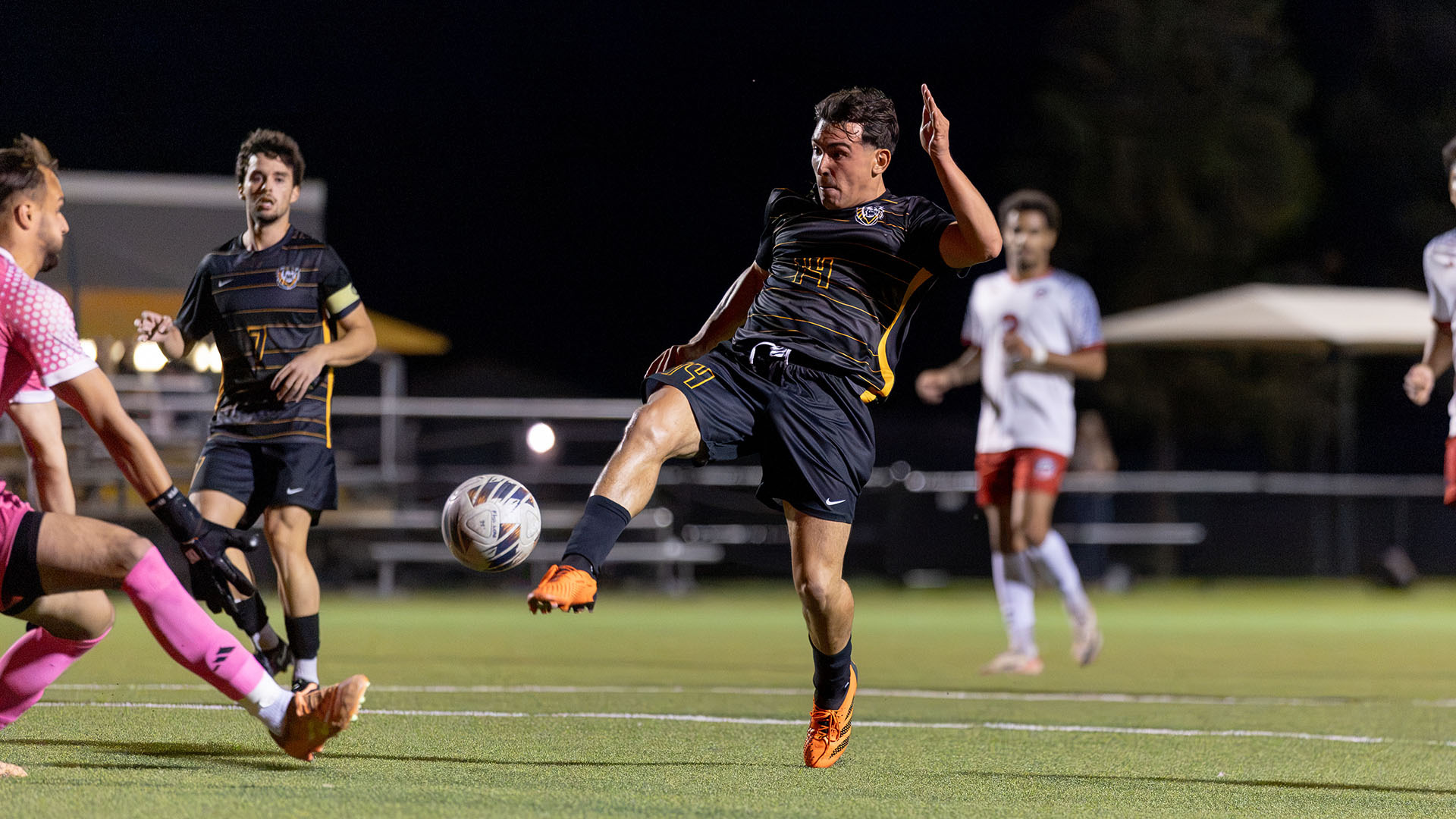 Francesco Valenti attacks a ball right in front of the goalkeeper vs. Newman 10-8-26