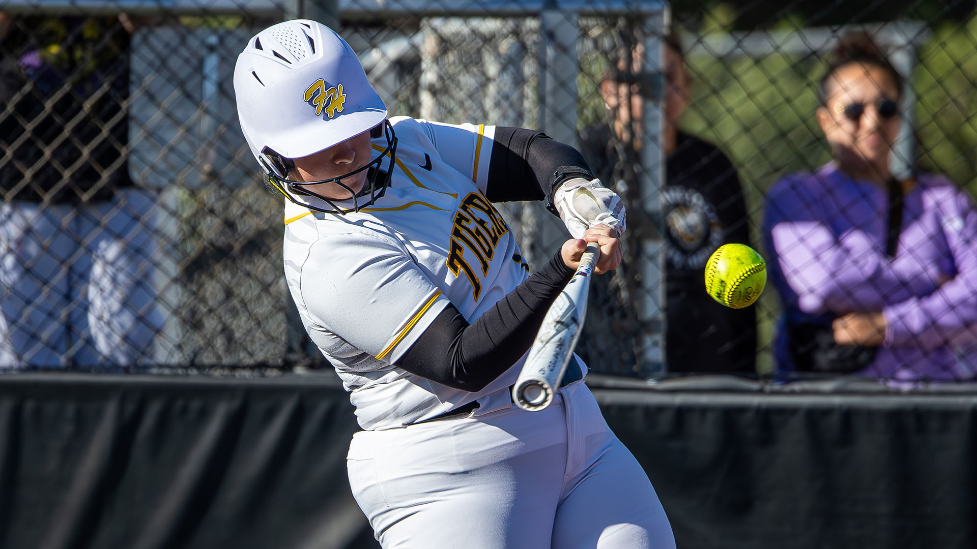 Alexis Mohr hits a ball during a doubleheader with Washburn