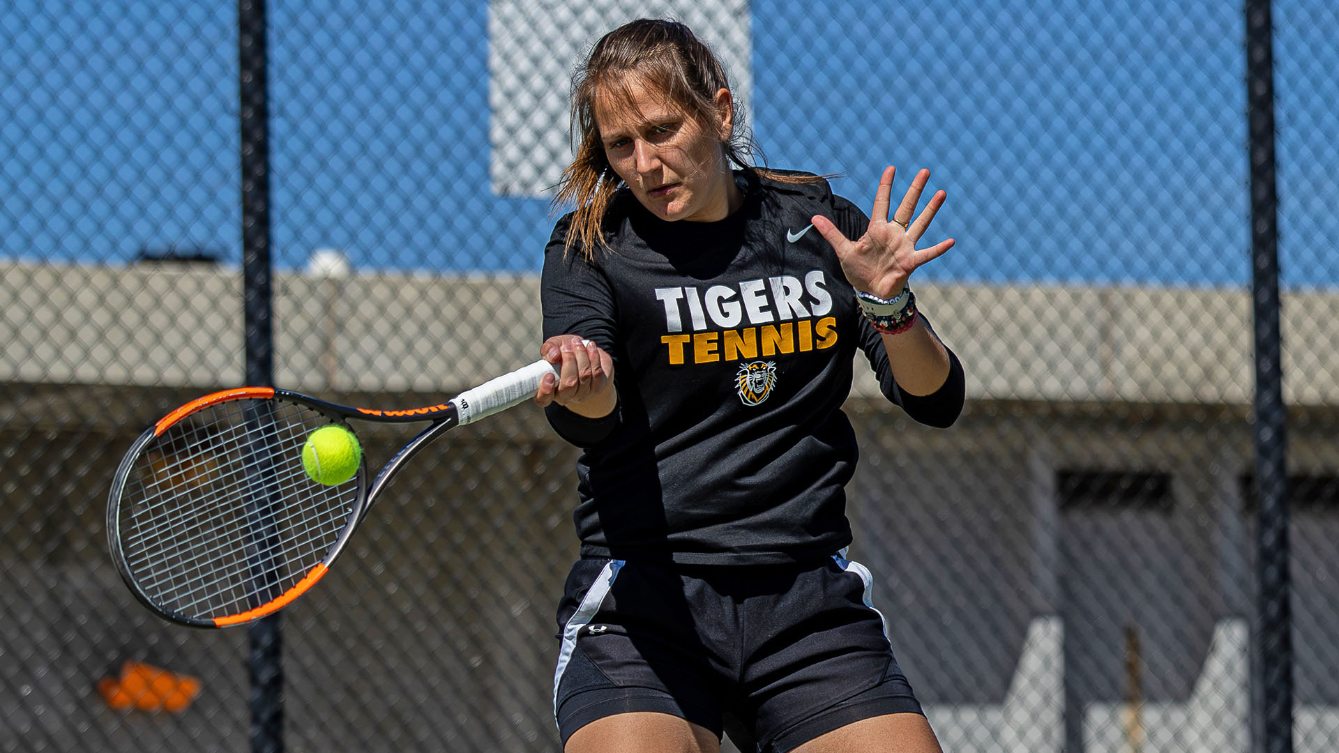Ines Steeman hits a return shot against Northwest Missouri State