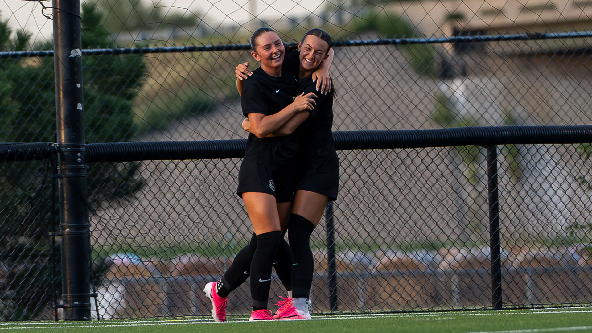 Berkley Sparks and Isabelle Mull celebrate a goal
