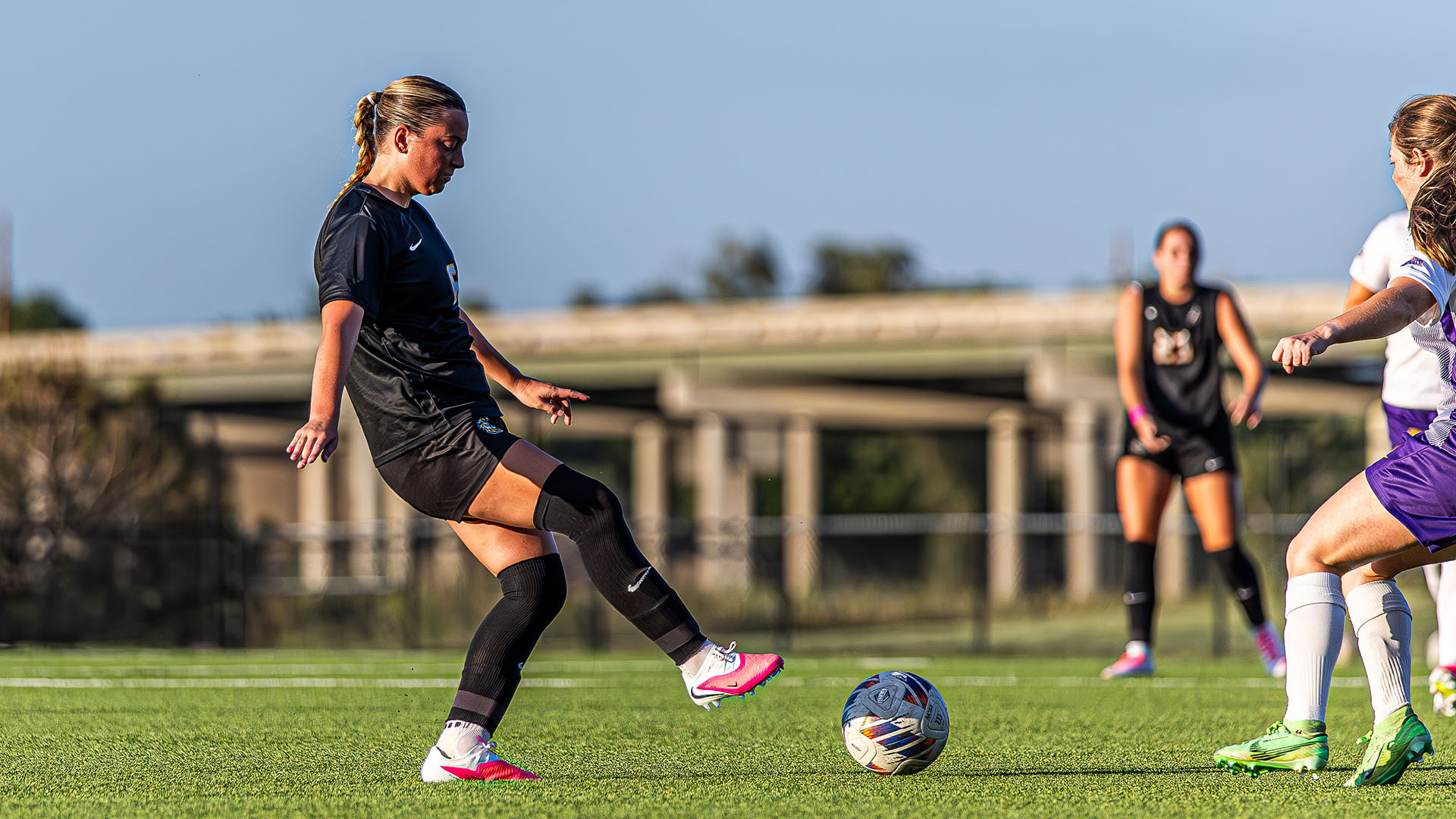 Jessica Russo strikes the ball in an exhibition against Kansas Wesleyan