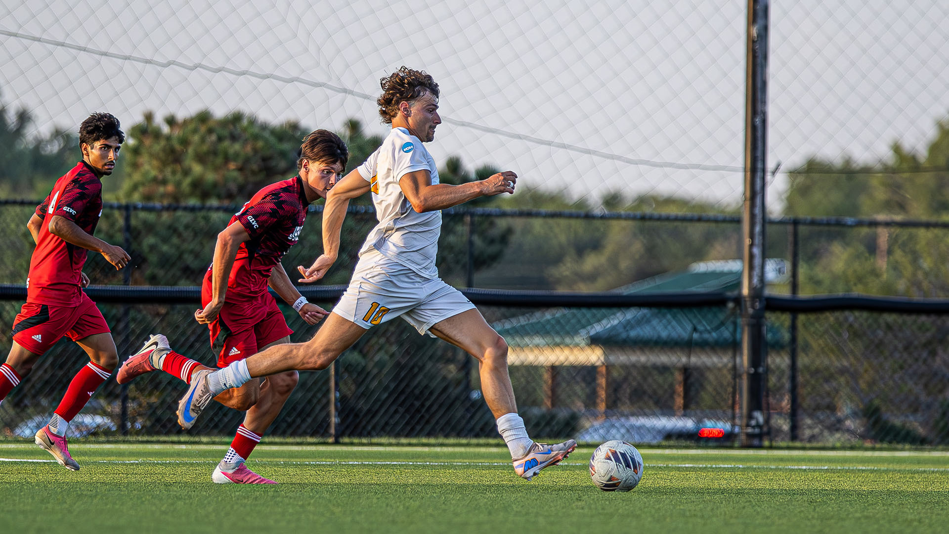 Len Valkema with the ball against William Jewell 9-2-26