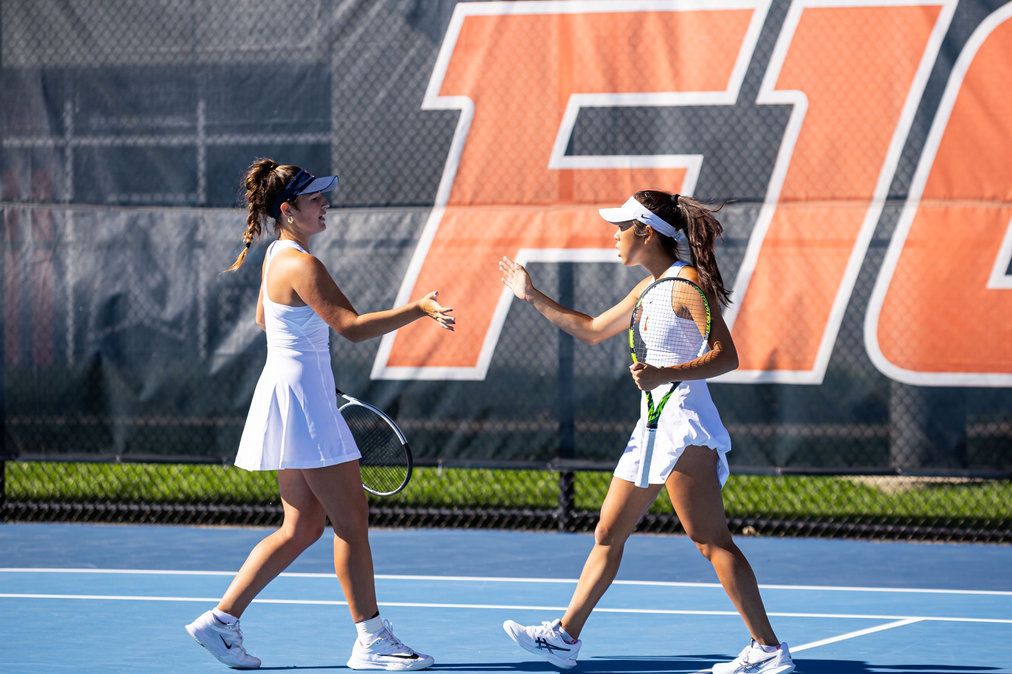 CHAMPAIGN, IL - October 20, 2025 - Tess Bucher and Alice Xu during the ITA Midwest Regionals at Atkins Tennis Center in Champaign, IL. Photo By Sofi Klein/Fighting Illini