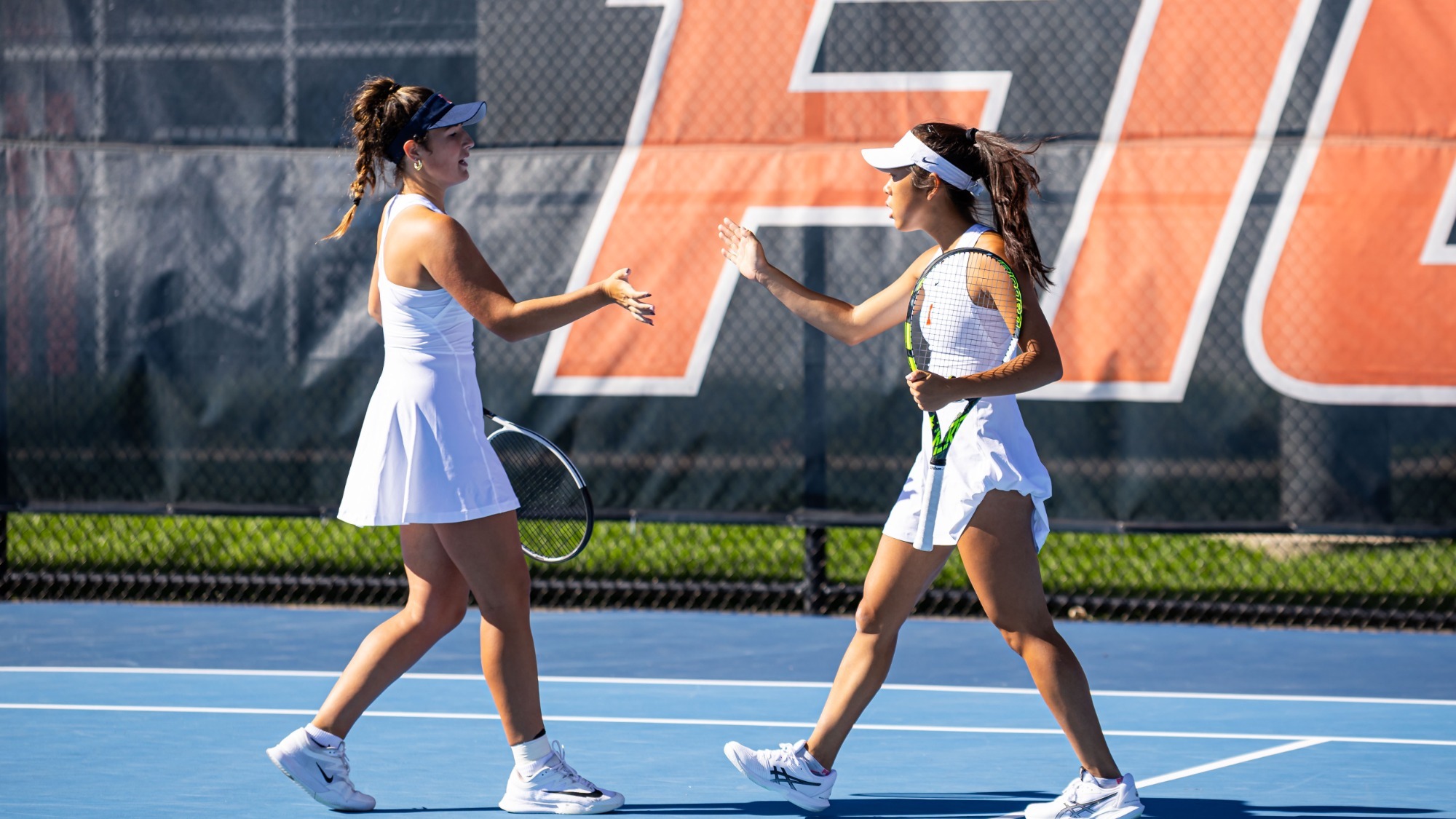 CHAMPAIGN, IL - October 20, 2025 - Tess Bucher and Alice Xu during the ITA Midwest Regionals at Atkins Tennis Center in Champaign, IL. Photo By Sofi Klein/Fighting Illini