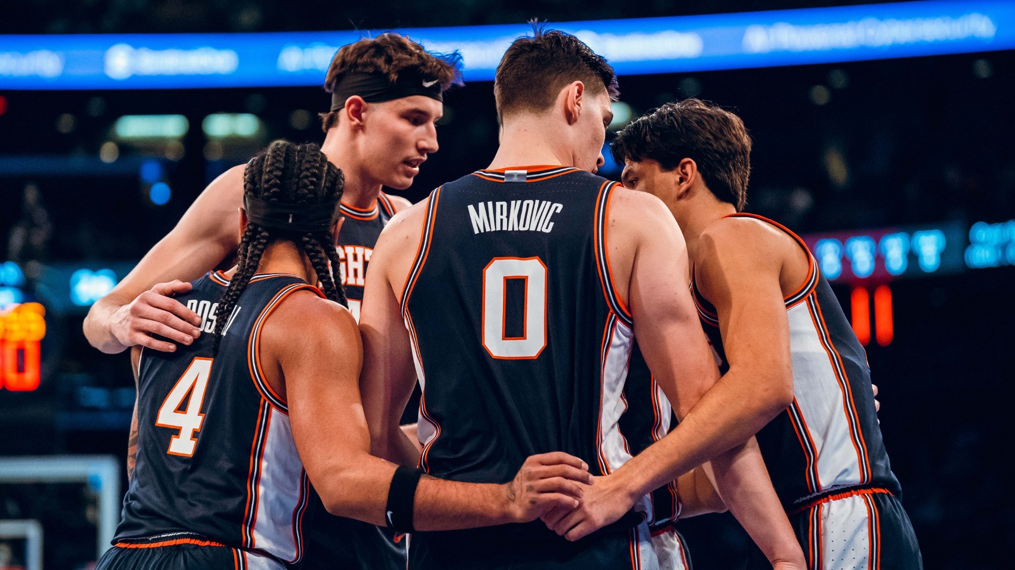 Team huddle vs. #5 UConn at Madison Square Garden_11-28-25 (Courtney Bay)
