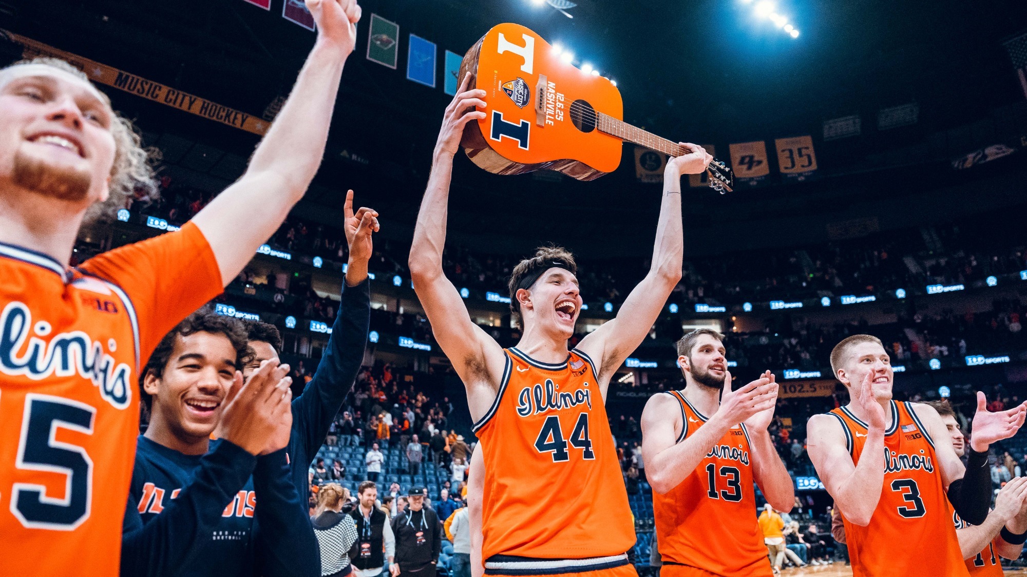 Team celebration vs. #13 Tennessee 12/6/25 (Courtney Bay)