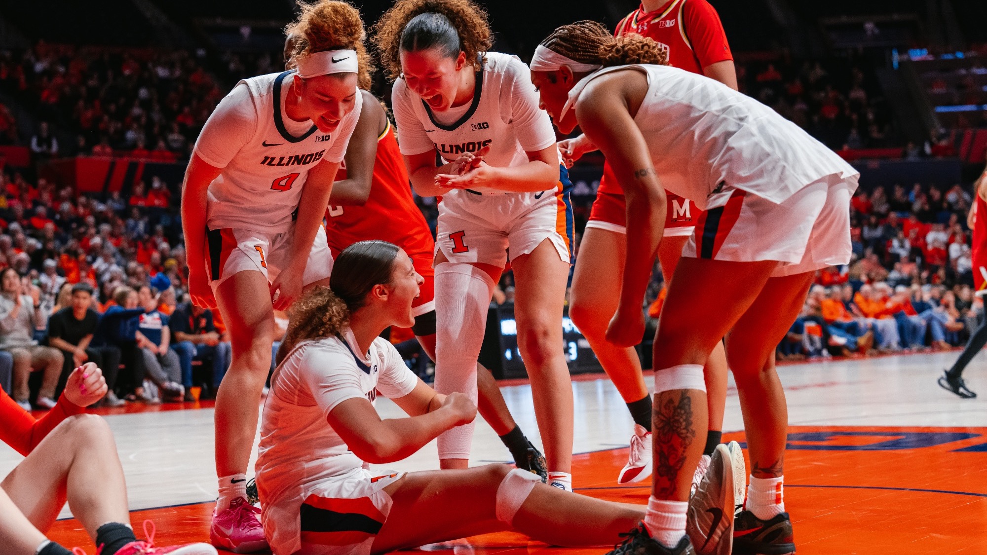Cearah Parchment celebrates with her teammates after a big play