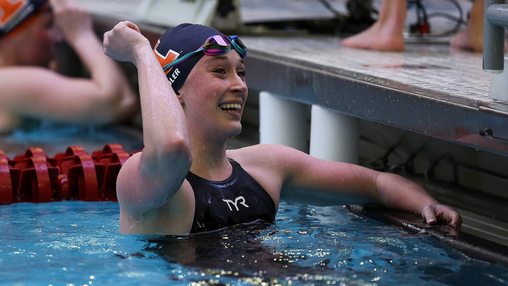 Maggie Adler smiling after a swim