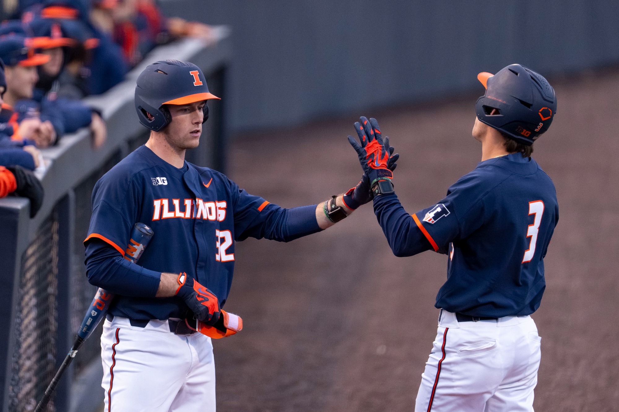 CHAMPAIGN, IL - February 25, 2026 - Infielder Kyle Schupmann (#32), Infielder Michael Farina (#3) during the game between the Lindenwood Lions and the Illinois Fighting Illini at Illinois Field in Champaign, IL. Photo By Ashley Ray/Fighting Illini