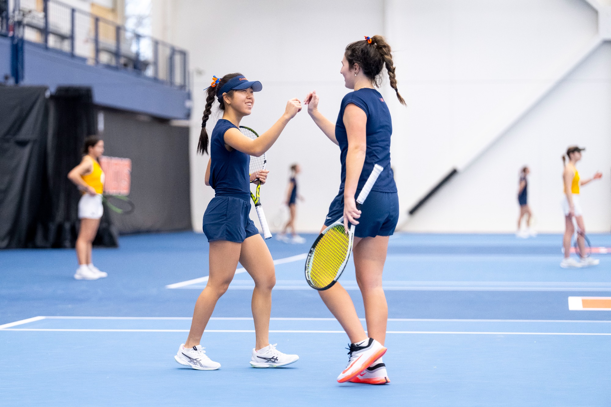 CHAMPAIGN, IL - March 02, 2026 - Alice Xu, Tess Bucher during the match between the UMKC Kangaroos and the Illinois Fighting Illini at Atkins Tennis Center in Champaign, IL. Photo By Ashley Ray/Fighting Illini