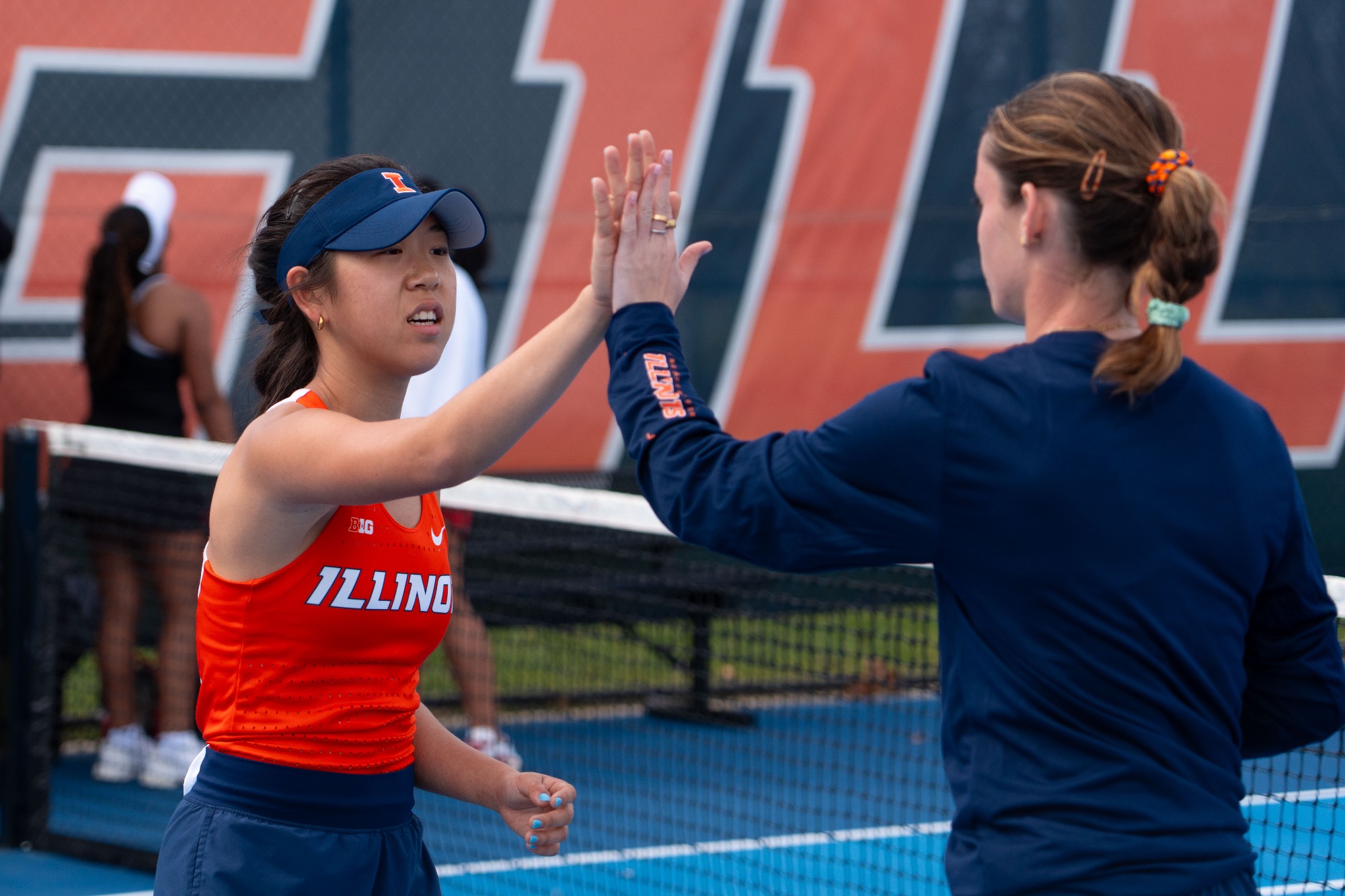 CHAMPAIGN, IL - March 22, 2026 - Alice Xu during the match between the Indiana Hoosiers and the Illinois Fighting Illini at Atkins Tennis Center in Champaign, IL. Photo By Ryan Shepardson / Fighting Illini