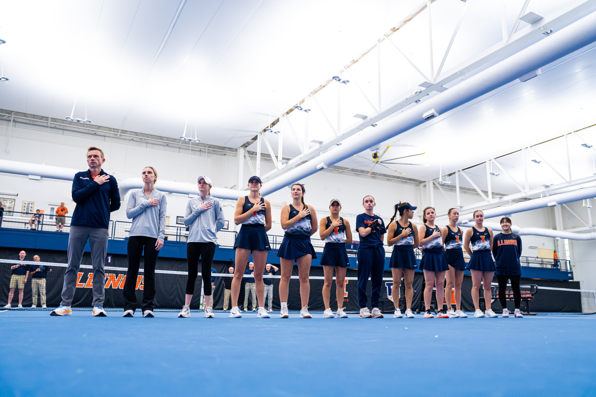 CHAMPAIGN, IL - April 12, 2026 - The Fighting Illini during the match between the USC Trojans and the Illinois Fighting Illini at Atkins Tennis Center in Champaign, IL. Photo By Lucas Sun