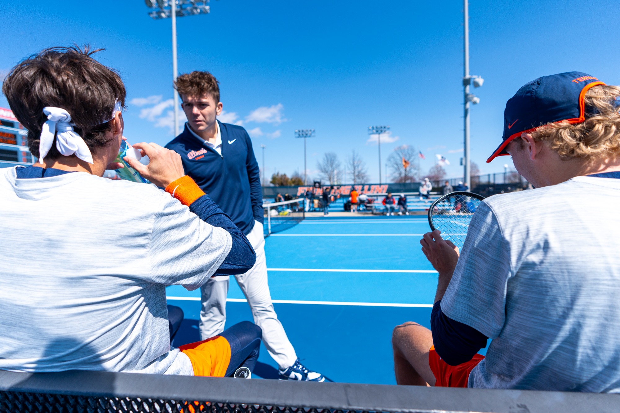 CHAMPAIGN, IL - April 05, 2026 - Assistant Coach Lucas Horve during the match between the Purdue Boilermakers and the Illinois Fighting Illini at Atkins Tennis Center in Champaign, IL. Photo By Knox Mynatt/Fighting Illini
