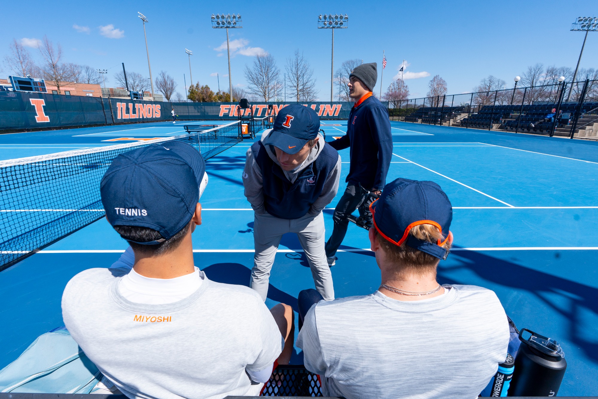 CHAMPAIGN, IL - April 05, 2026 - Assistant Coach Tim Kopinski during the match between the Purdue Boilermakers and the Illinois Fighting Illini at Atkins Tennis Center in Champaign, IL. Photo By Knox Mynatt/Fighting Illini