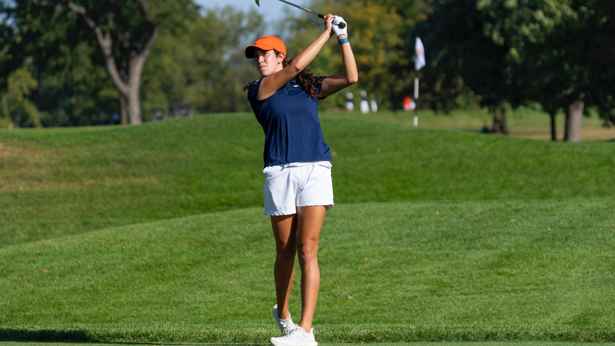 Alexis Myers swings golf club