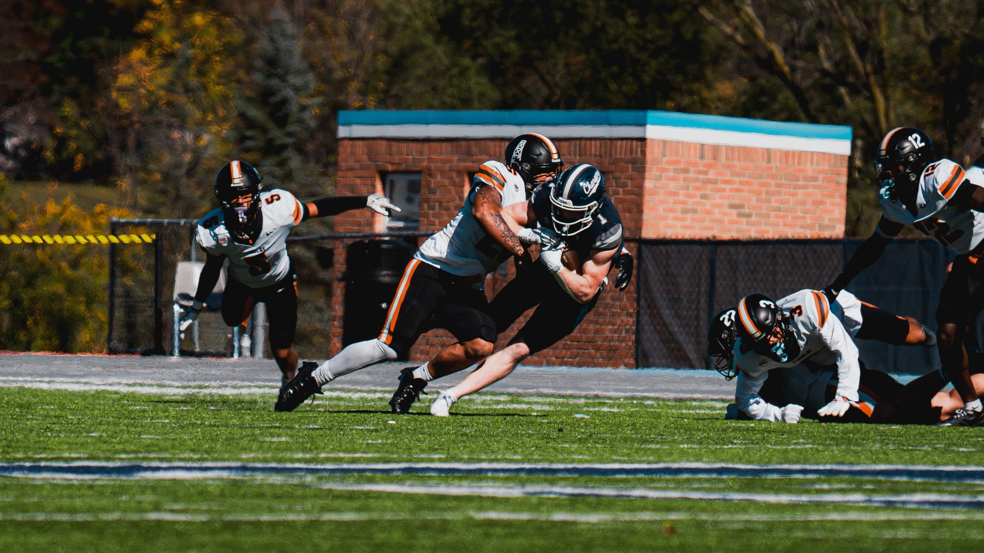 Football Tackl Hillsdale at KC