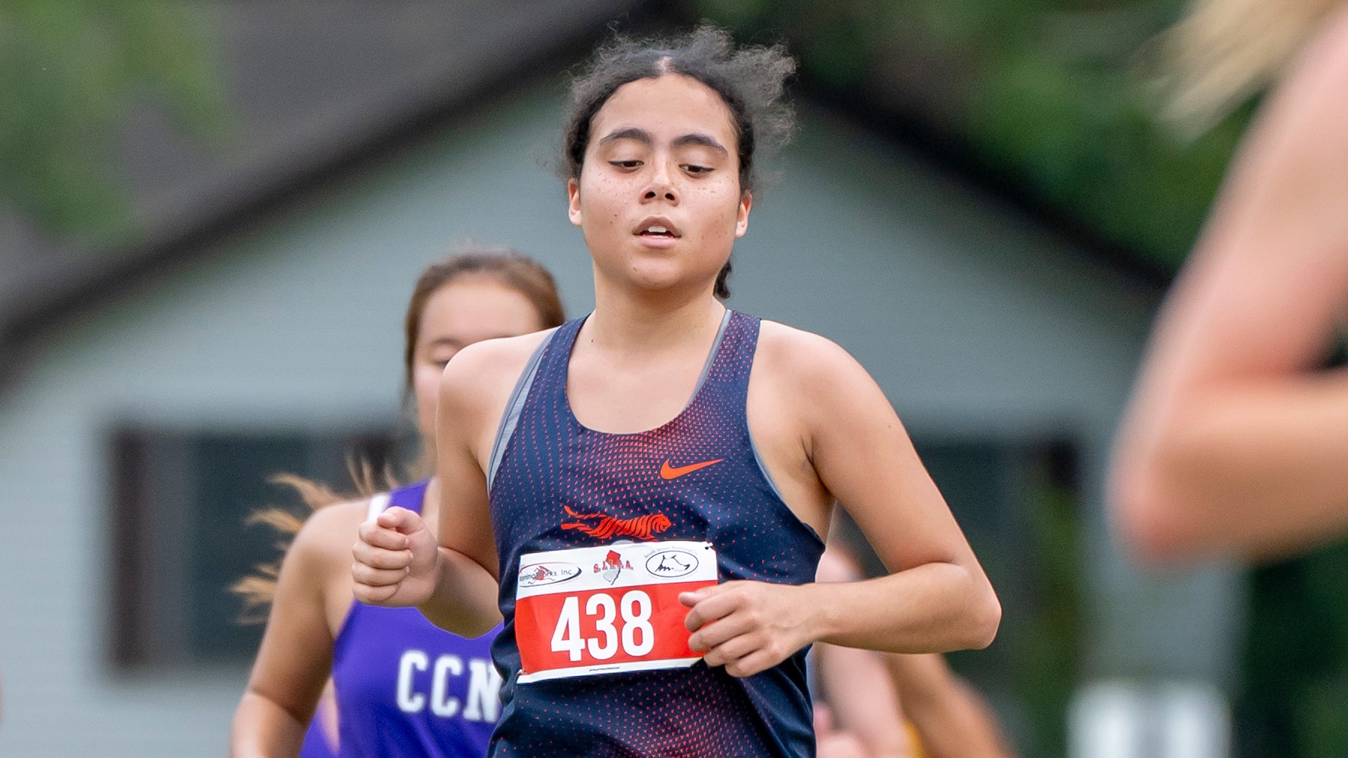 Mayelie Mena competes for the Fashion Institute of Technology women’s cross country team at the Queensborough Cross Country Invitational at Van Cortlandt Park.