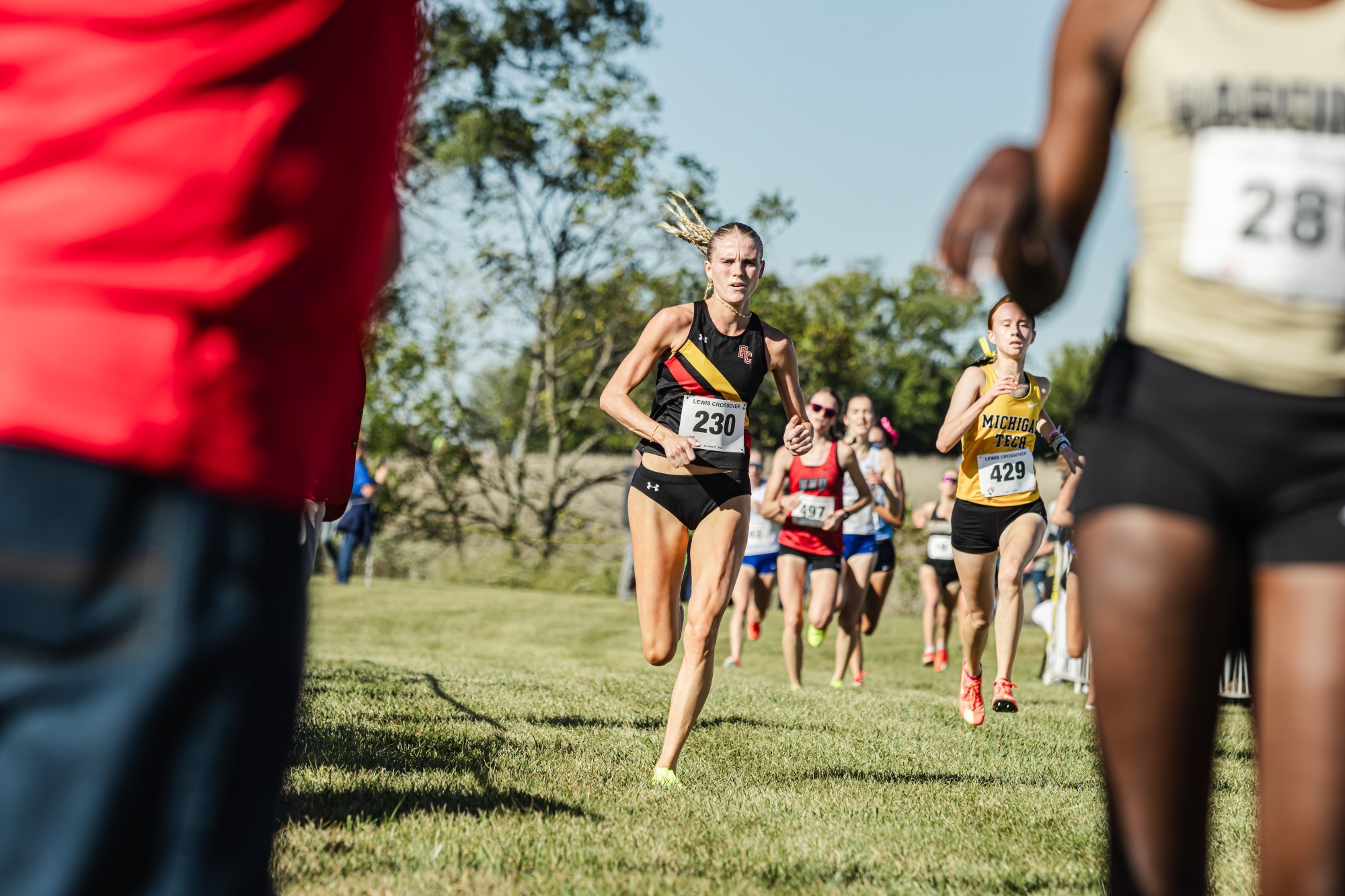 Abby Misch running towards the finish line