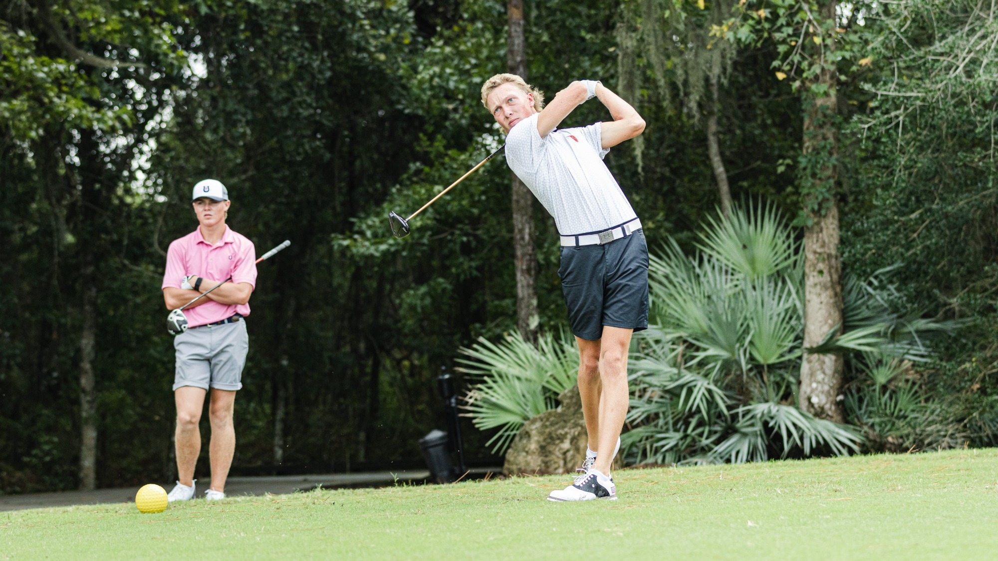 Masen McKain hits an iron off the tee