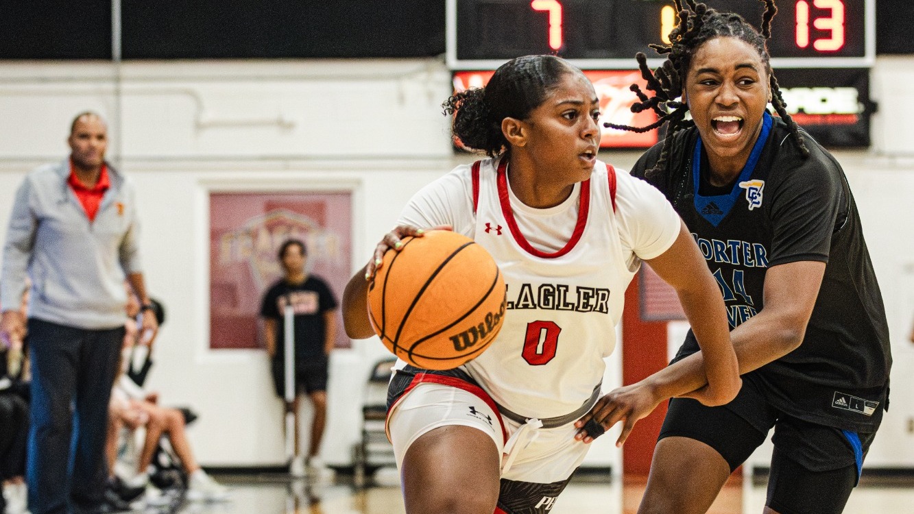 Aspen Weeks driving to the basket past a defender