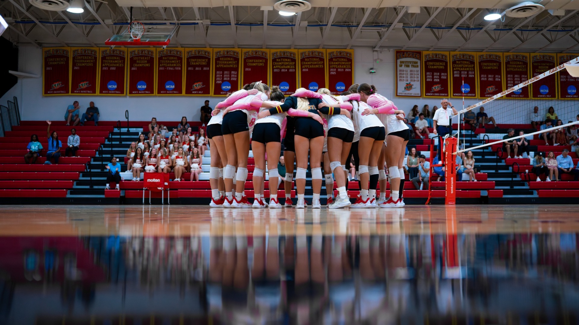 Pregame team huddle from a low angle