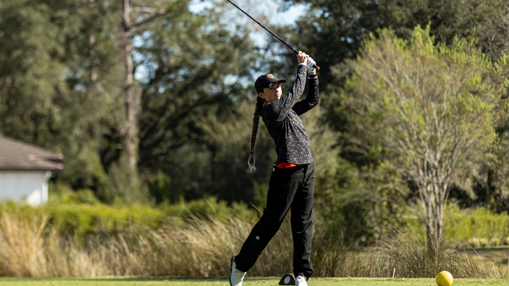 Tabitha Hanely hits a driver off the tee box