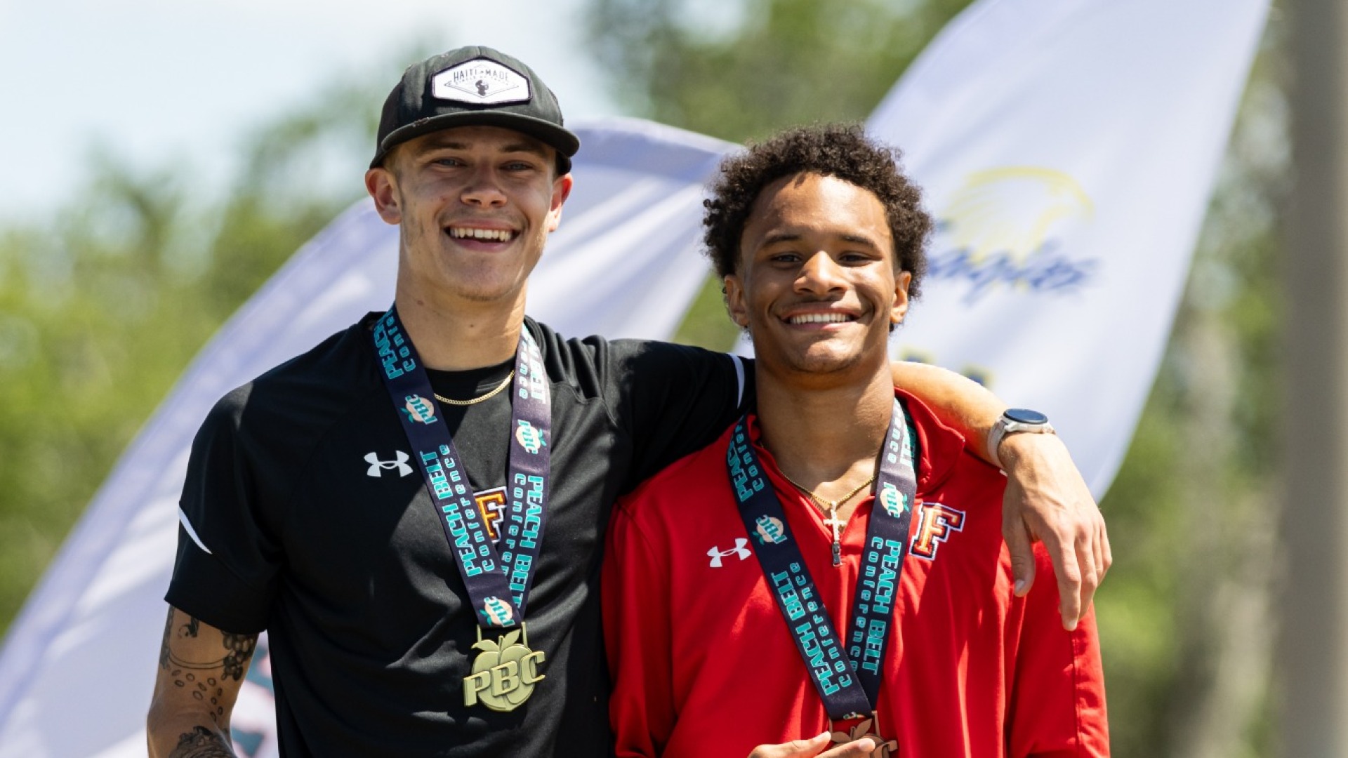 Will Stone and Kaleb Hollins smiling together
