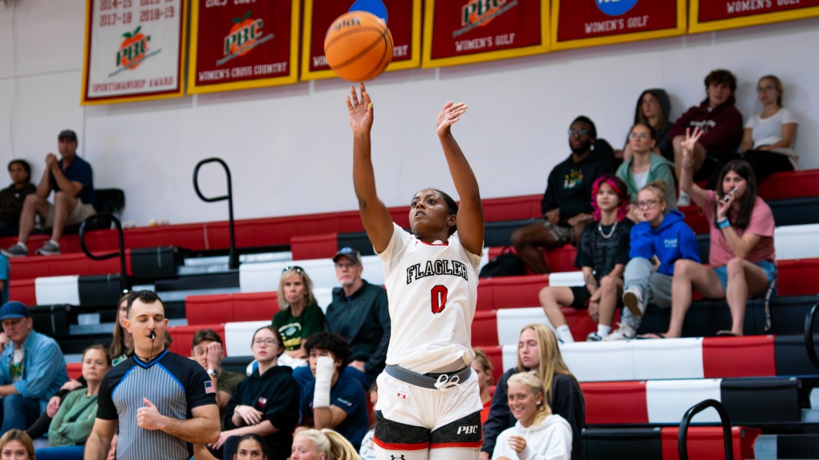 Aspen Weeks shoots a three-pointer