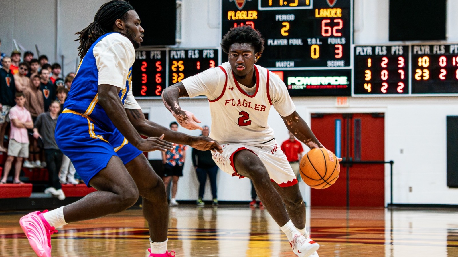 Mason Mannning drives to the basketball