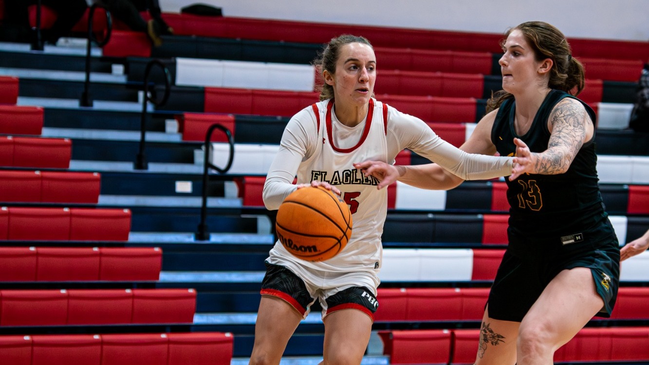Natalie Herrin drives past a defender 