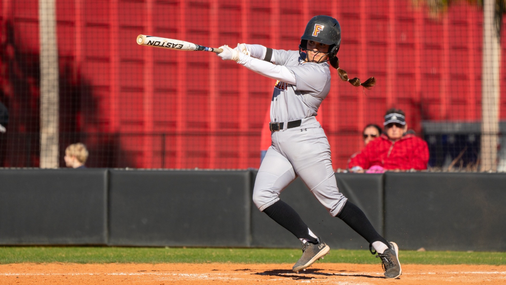 Brooke Maher swinging to hit the ball