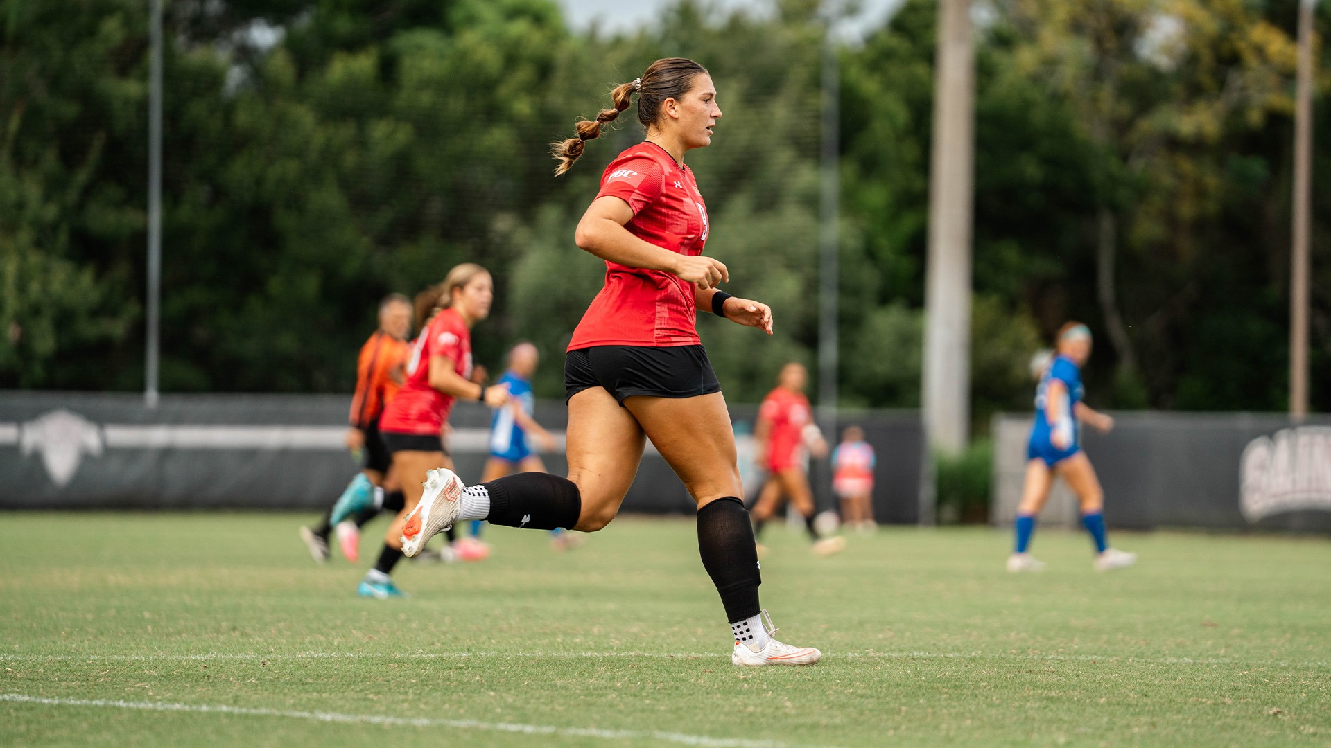 Brooke Rienecker running vs. Lander