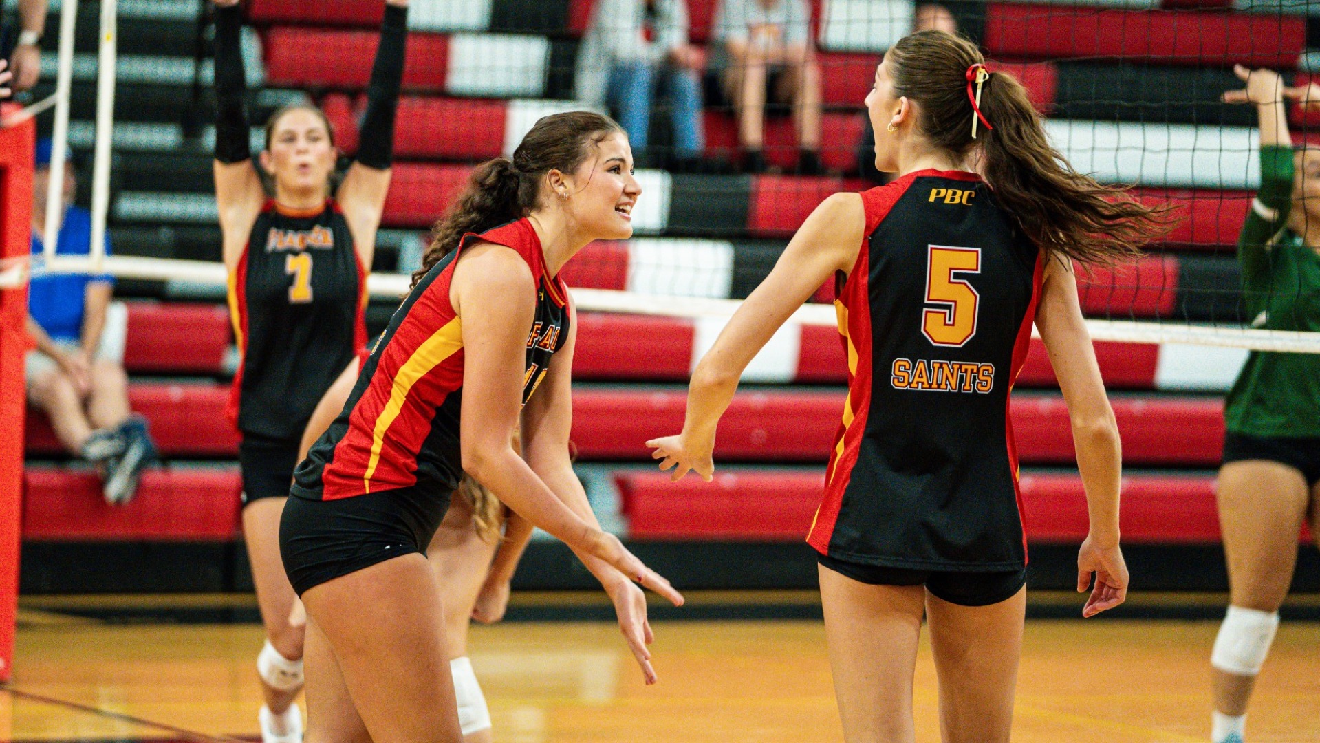 Bella Law and Gia Lowe celebrating a point