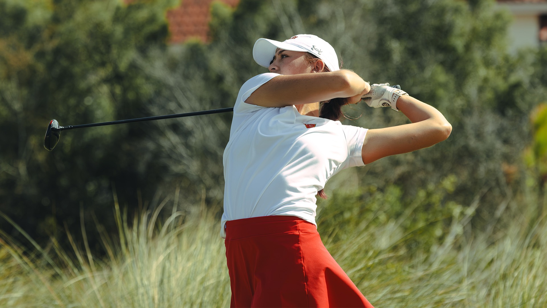 Kalia Polete teeing off at Flagler Fall Slam