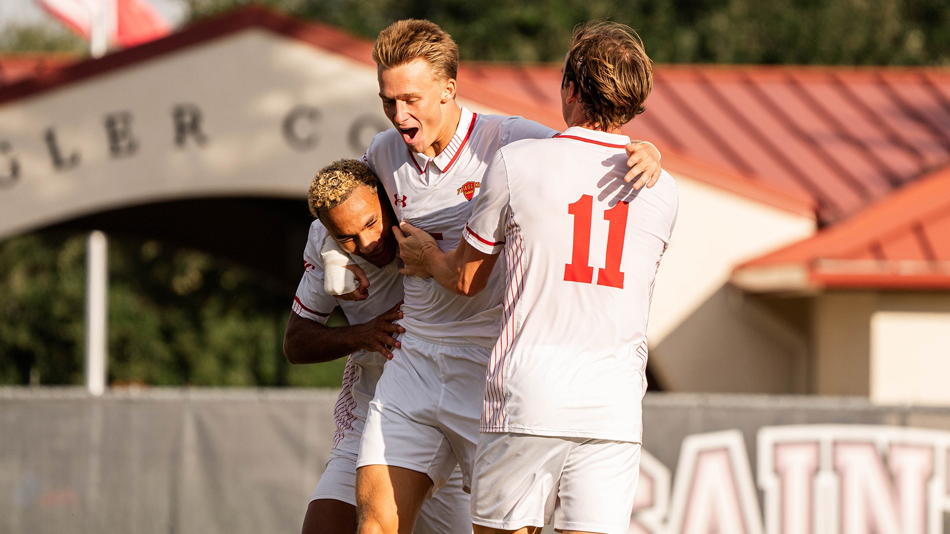 Men's soccer celebrating against Middle Georgia