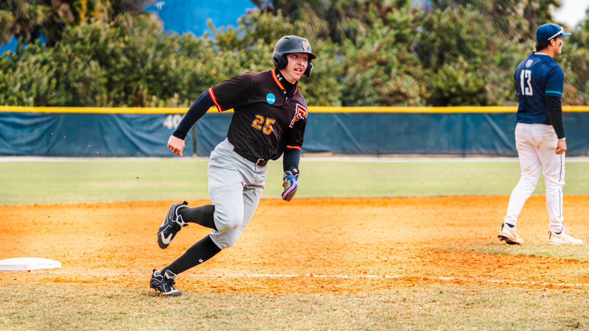 George Gilson rounds third base