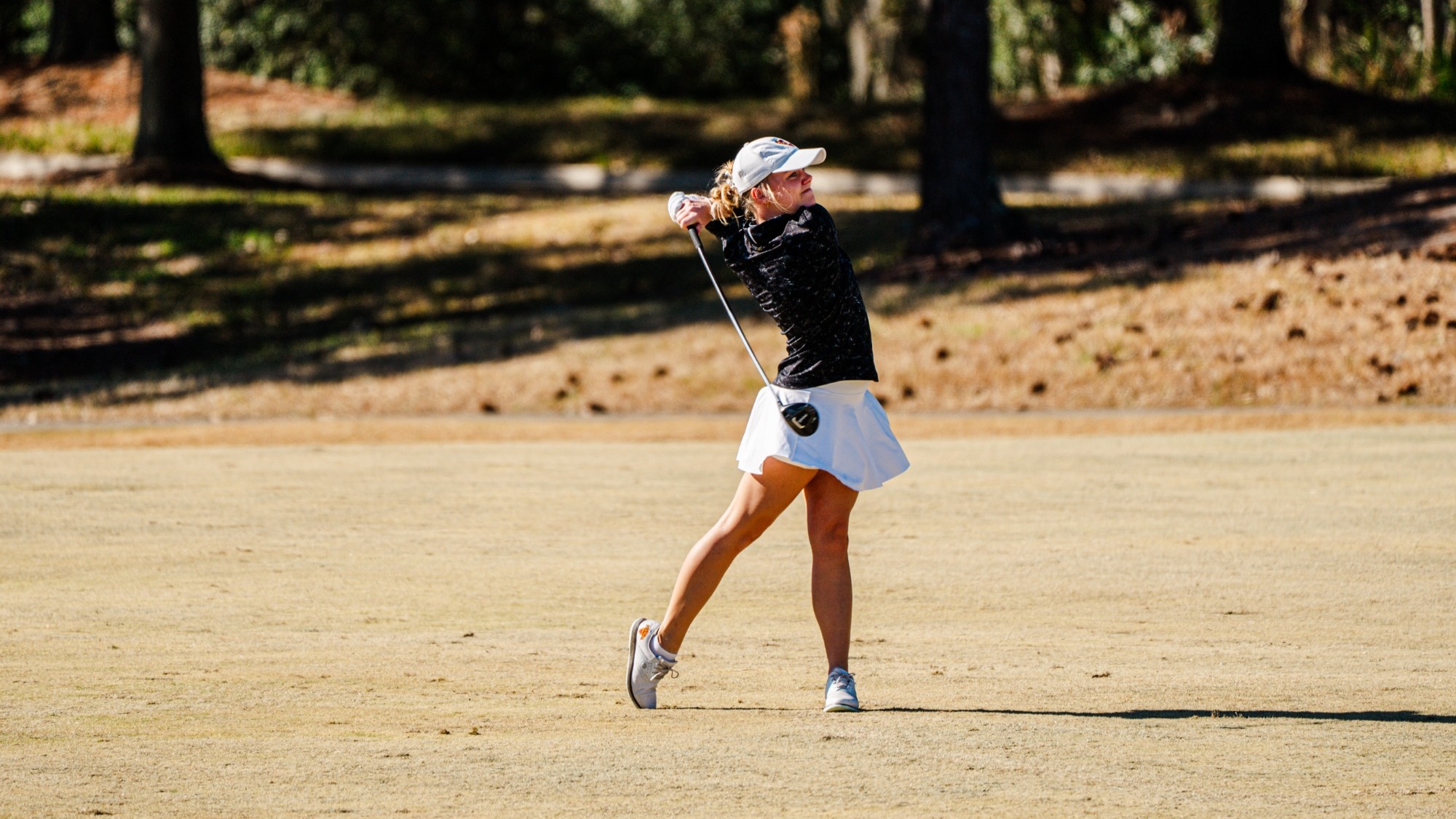 Henriette Stranda completes her swing on the fairway