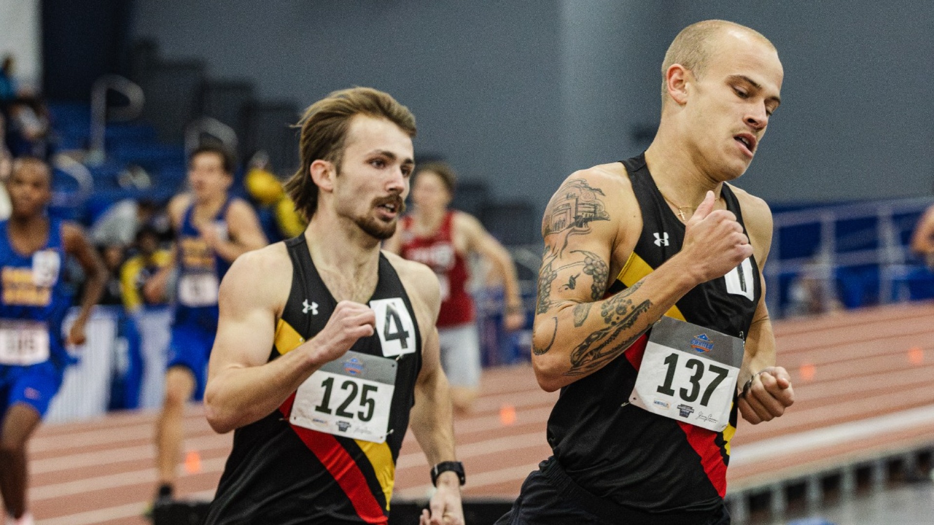 Will Stone and John Carbone running closely